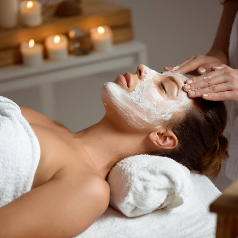 young-woman-mask-face-relaxing-spa-salon